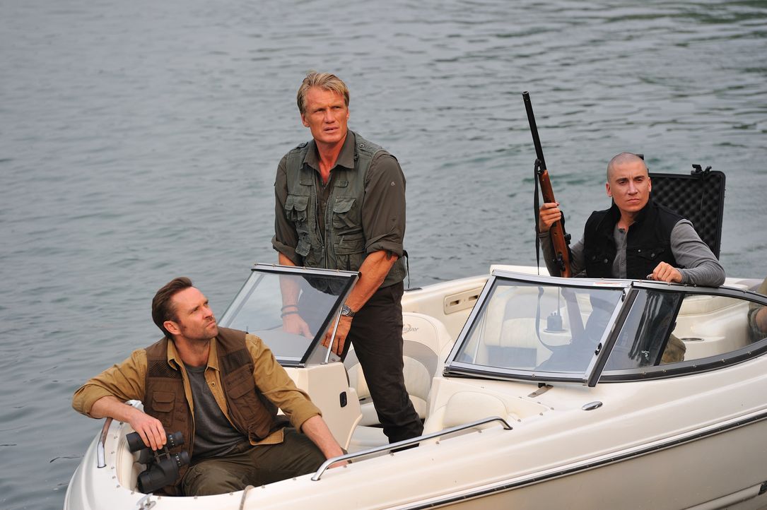 Kennen kein Mitleid mit den Kreaturen, die sie jagen: (v.l.n.r.) Chuck (Murray Clive Walker), Großwildjäger Harker (Dolph Lundgren) und Greg (Ivan K...