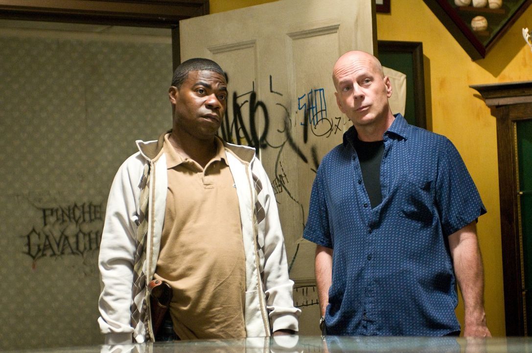 Lassen sich auf einen Deal mit einem Gangsterboss ein, um an eine Baseballsammelkarte zu kommen: Paul (Tracy Morgan, l.) und Jimmy (Bruce Willis, r.... - Bildquelle: 2010 Warner Bros.
