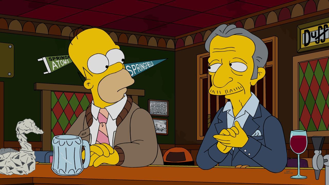 Spielt ein böses Spiel mit Homer (l.) und versucht, ihn und seine Frau auseinander zubringen: Nigel (r.) ... - Bildquelle: 2016-2017 Fox and its related entities. All rights reserved.