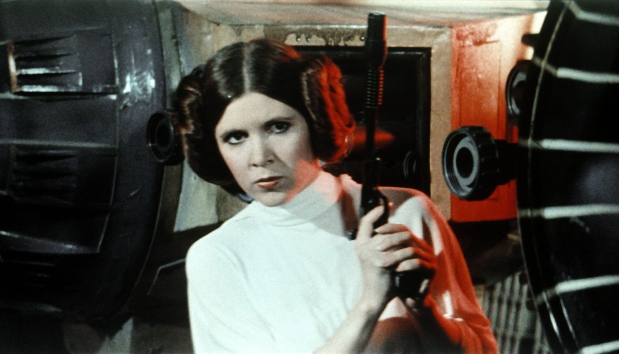 Prinzessin Leia (Carrie Fisher), die die Herrschaft über das galaktische Imperium übernehmen soll, wird von den imperialen Truppen gefangen genomm... - Bildquelle: Lucasfilm LTD. & TM. All Rights Reserved.