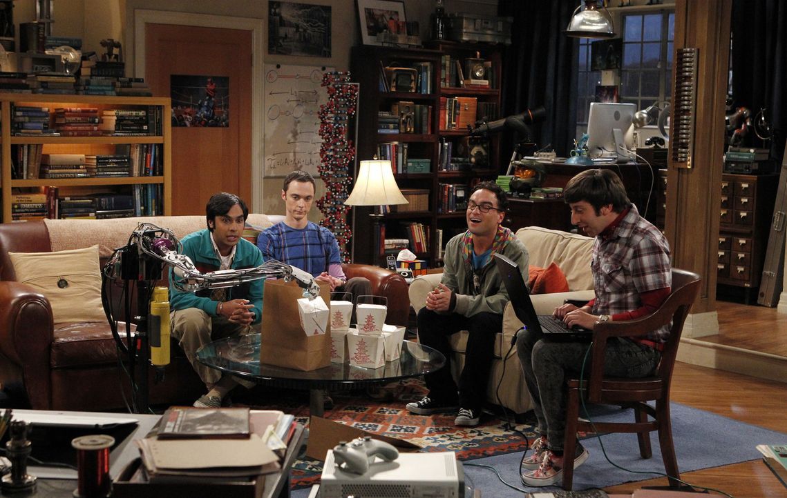 Koothrappali (Kunal Nayyar, l.), Sheldon (Jim Parsons, 2.v.l.) und Leonard (Johnny Galecki, 2.v.r.) sind begeistert von dem Roboterarm, den Howard (... - Bildquelle: Warner Bros. Television