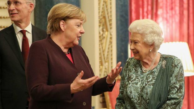 Merkel bei Queen und Johnson